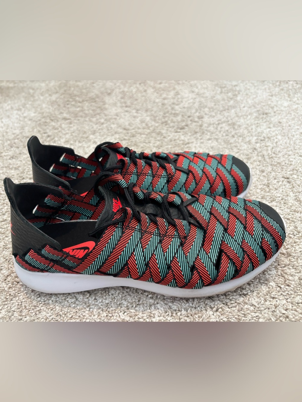 Nike women’s Woven Sneakers in Red & Teal Stripe